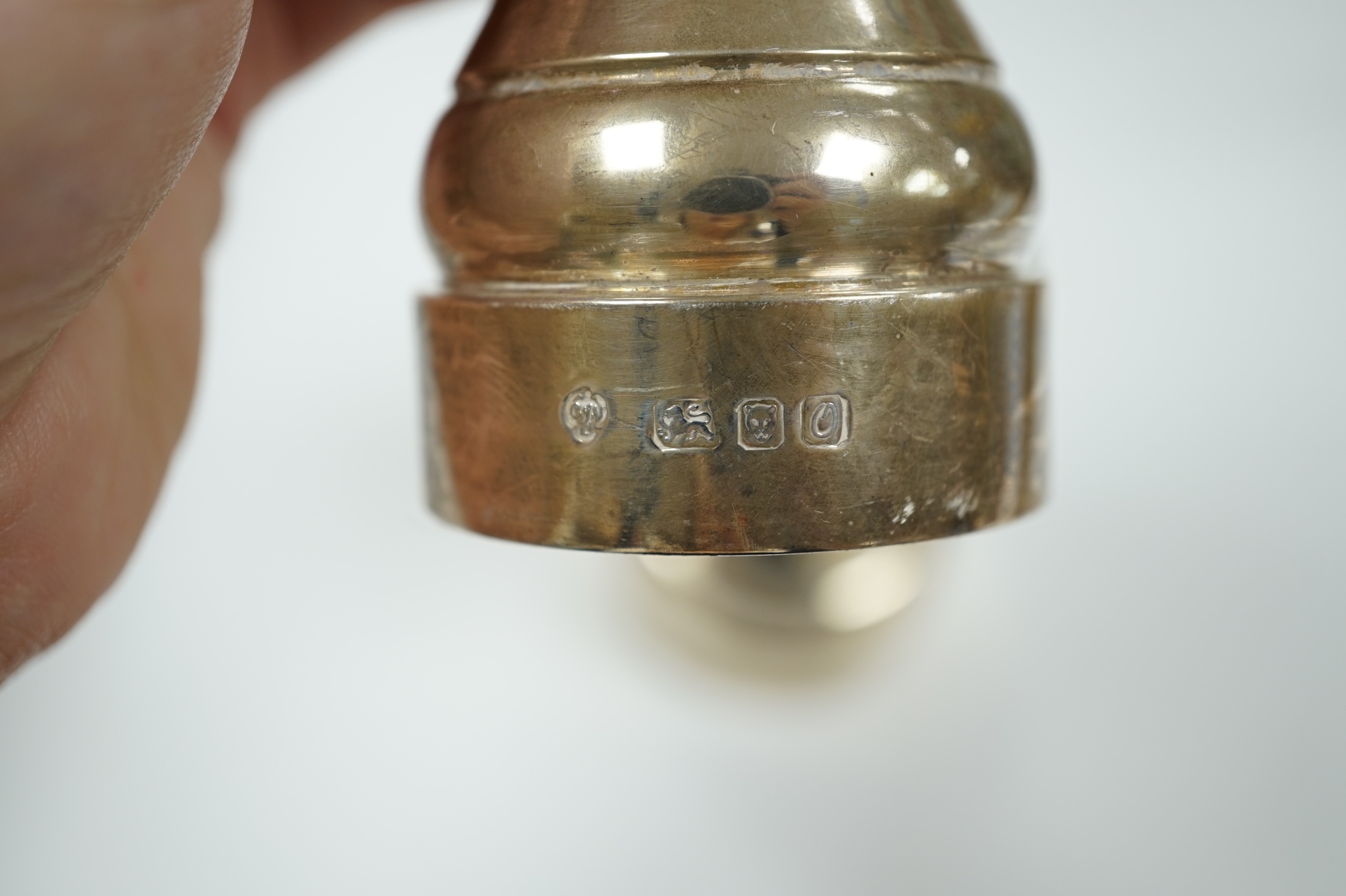 Two modern silver mounted pepper grinders, tallest 10.2cm.